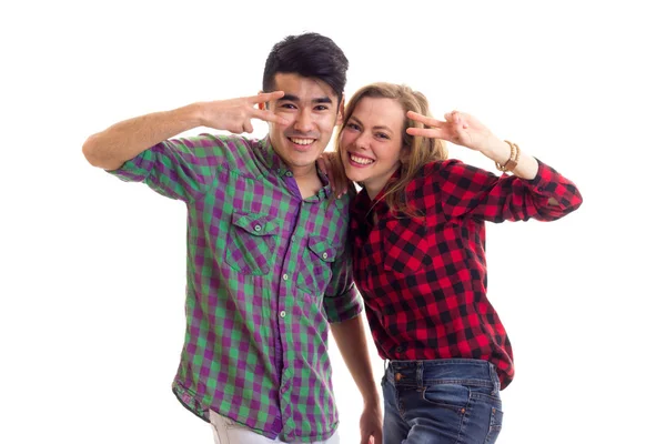 Young couple in plaid shirts — Stock Photo, Image