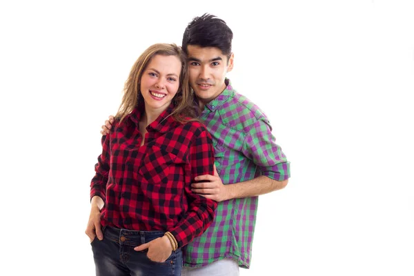 Jovem casal em camisas xadrez — Fotografia de Stock