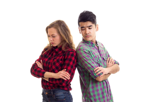 Jovem casal em camisas xadrez — Fotografia de Stock