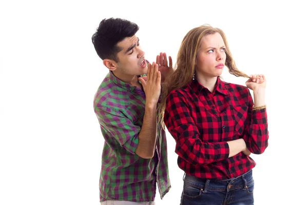 Young couple in plaid shirts arguing — Stock Photo, Image