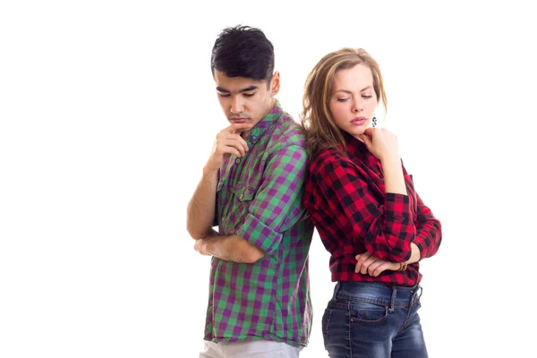 Jovem casal em camisas xadrez — Fotografia de Stock