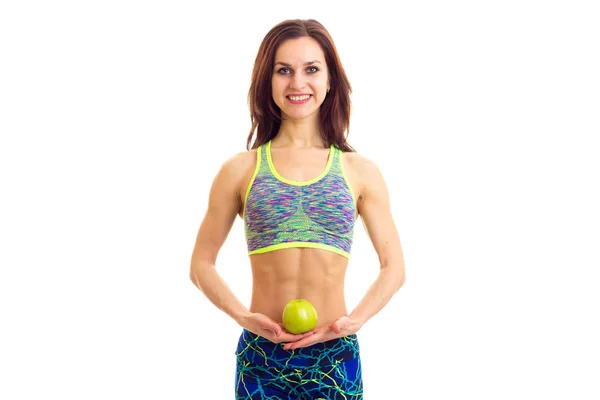 Sportieve vrouw bedrijf apple — Stockfoto