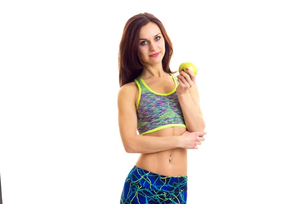 Donna sportiva in possesso di mela — Foto Stock