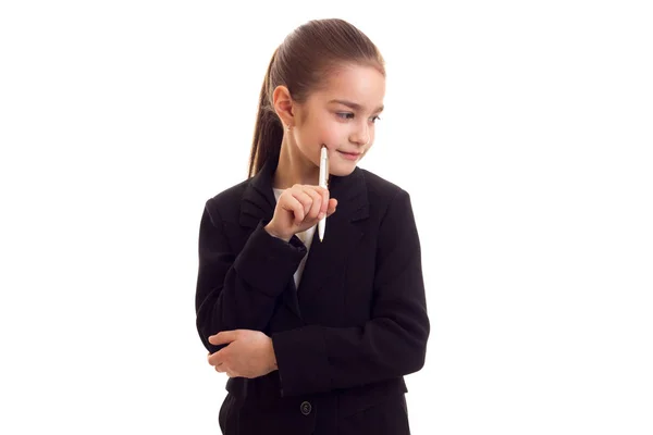 Menina em preto jaqueta segurando caneta — Fotografia de Stock