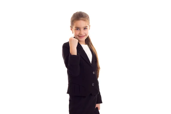 Klein meisje in zwarte jas bedrijf diplomaat — Stockfoto