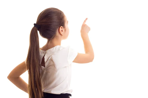 Little girl in white T-shirt and black skirt — Stock Photo, Image