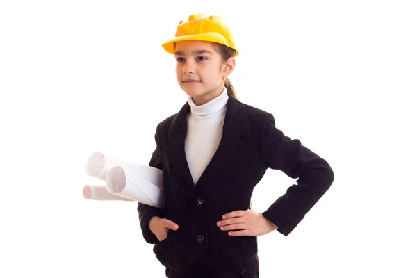 Little girl in yellow protective helmet — Stock Photo, Image