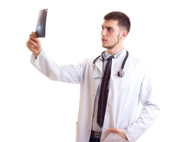 Young man in doctor gown — Stock Photo, Image