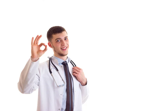 Young man in doctor gown — Stock Photo, Image