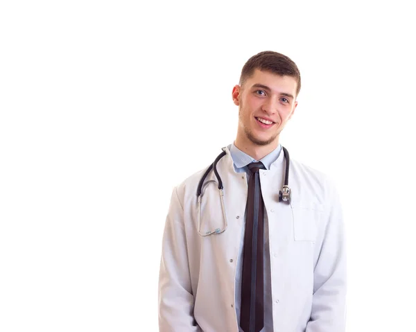 Молодой человек в халате врача — стоковое фото