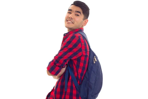 Mladý muž s batohem — Stock fotografie