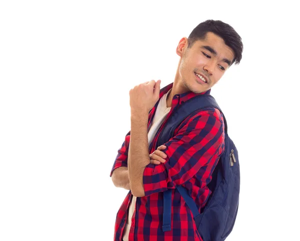 Junger Mann mit Rucksack — Stockfoto