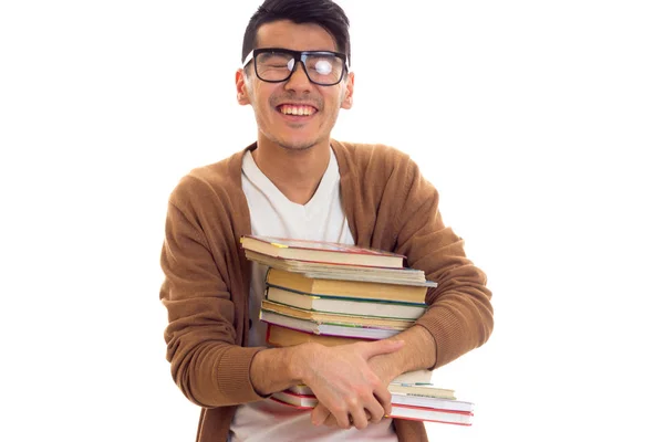 Junger Mann mit Brille und Büchern — Stockfoto