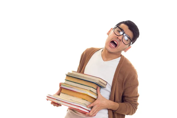 Jovem de óculos com livros — Fotografia de Stock