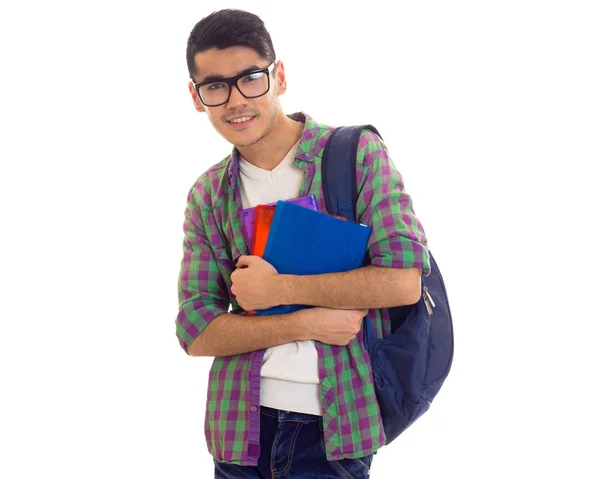 Mladý muž s batohem a knihy — Stock fotografie