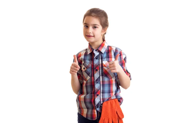 Liten flicka med orange handskar — Stockfoto
