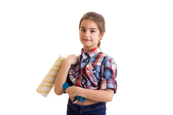 Malá holčička drží bílé roll — Stock fotografie