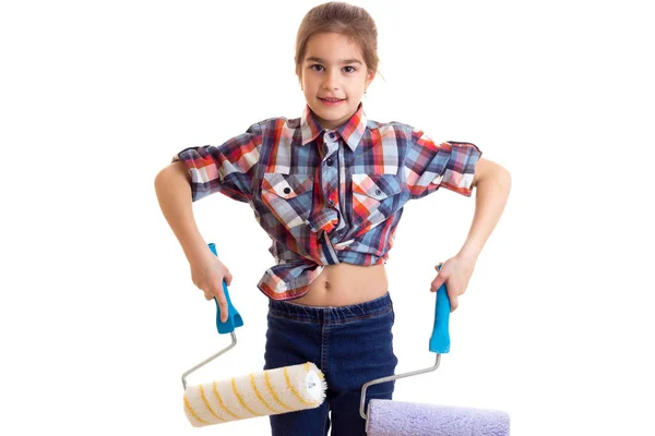 Menina segurando rolos brancos — Fotografia de Stock