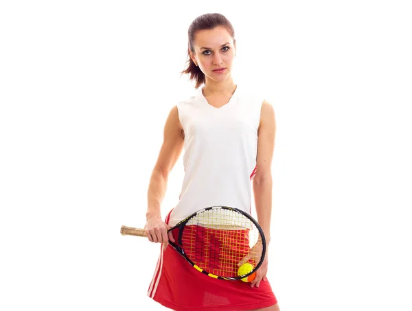 Жінка з тенісним ракеткою і м'ячем — стокове фото