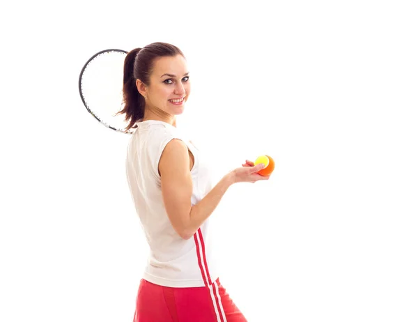 Kvinna med tennisracket och boll — Stockfoto