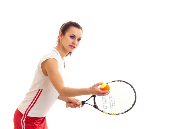 Kvinna med tennisracket och boll — Stockfoto