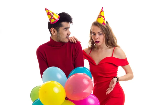 Ungt par med ballonger — Stockfoto