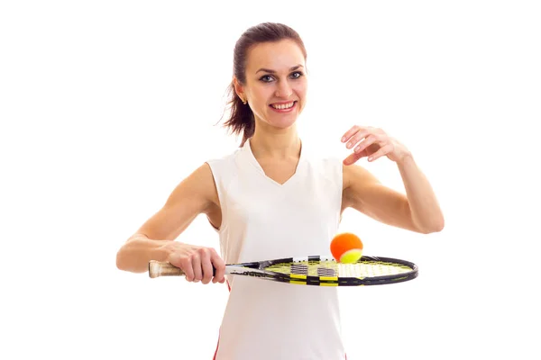 Femme avec raquette de tennis et balle — Photo