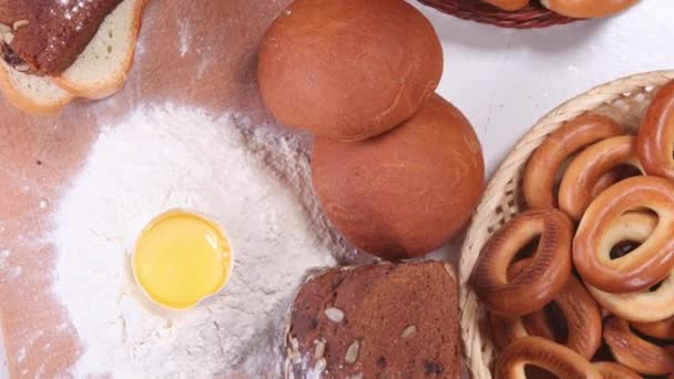 Top view and spinning over table where bread preparing for baking — Stock Video