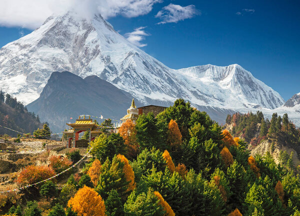 Buddhist monastery and Manaslu mount in Himalayas, Nepal