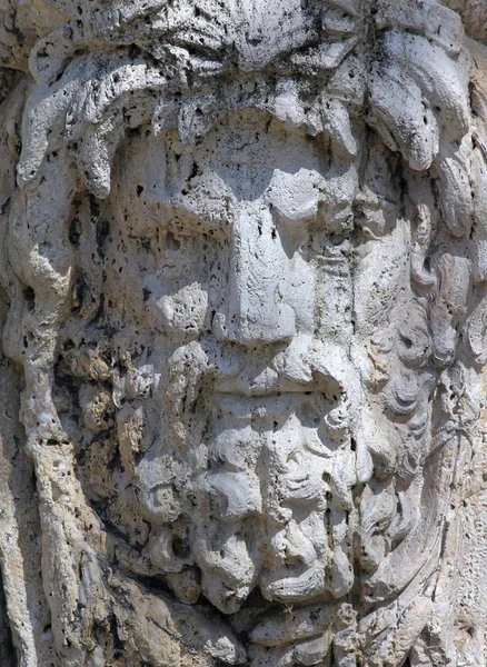 Carved stone face — Stock Photo, Image