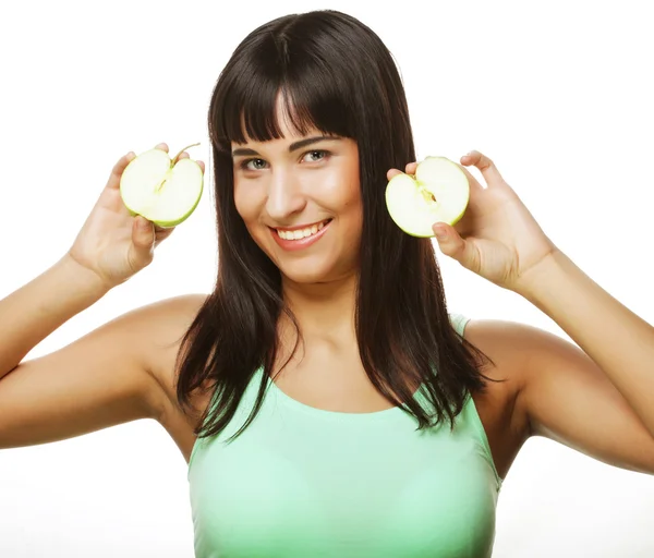 Ung lycklig kvinna som håller gröna äpplen. — Stockfoto