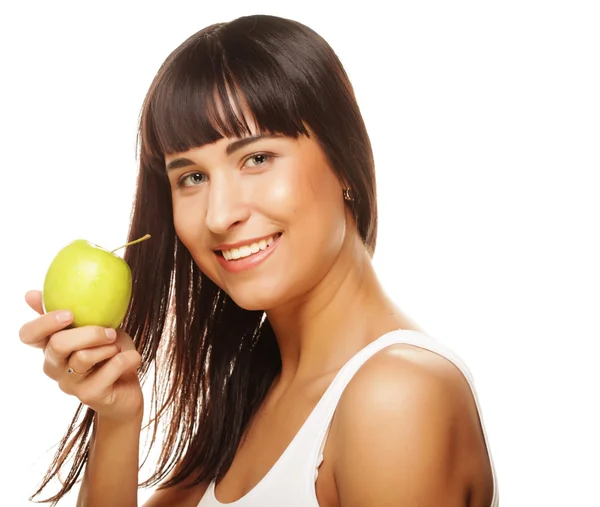 Jeune femme souriante heureuse avec pomme verte — Photo