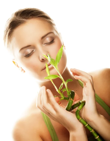 Young beautiful woman with bamboo — Stock Photo, Image