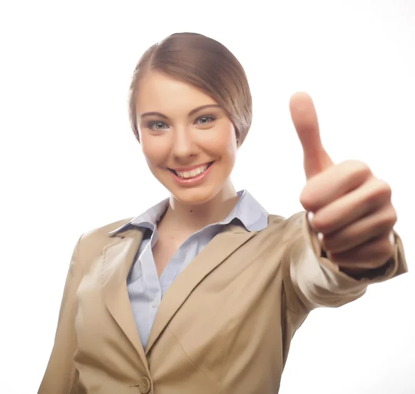 Happy businesswoman making an ok sign Stock Picture