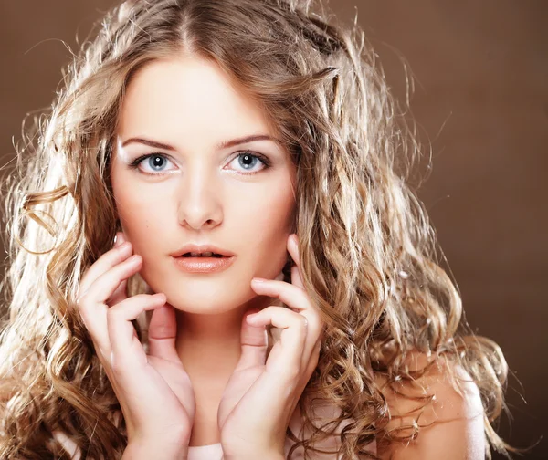 Image of beautiful young woman with curly hair — Stock Photo, Image