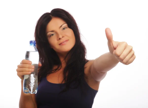 Kobiecy model sprawności z butelką wody — Zdjęcie stockowe