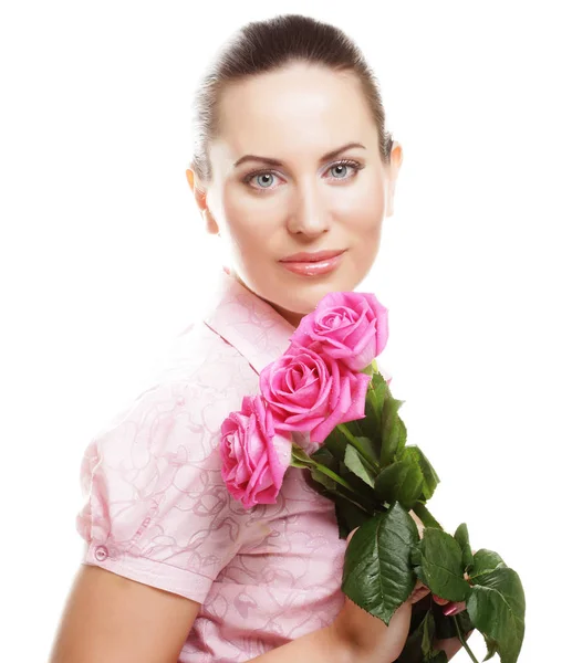 Frau mit einem Strauß rosa Rosen — Stockfoto