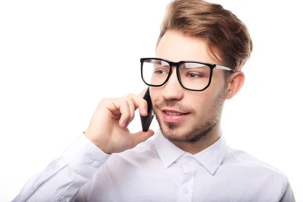 Portrait of a young businessman talking on the phone — Stock Photo, Image