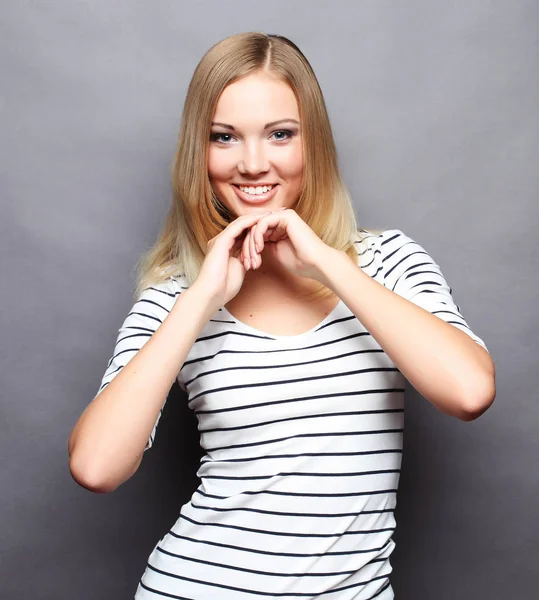 Lifestyle  and people concept: Young cute smiling blond girl — Stock Photo, Image