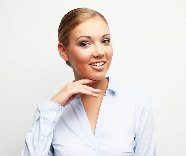 Portrait of happy young business woman over white background — Stock Photo, Image