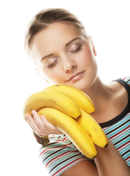 Lachende jonge vrouw met banaan — Stockfoto