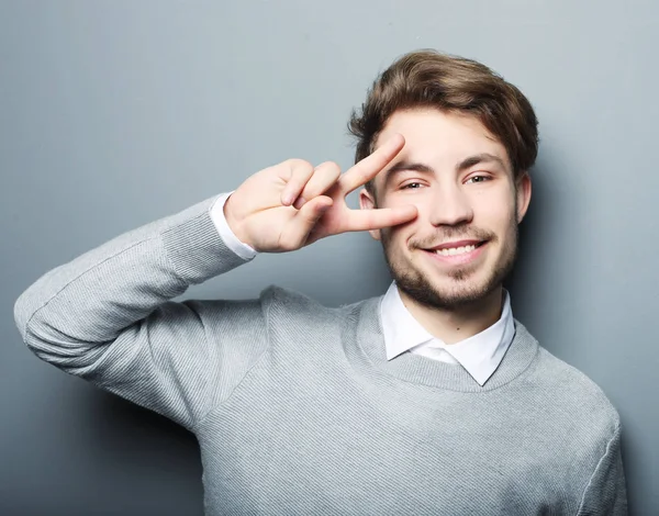 Young man wearing casual posing in studio — Stock Photo, Image