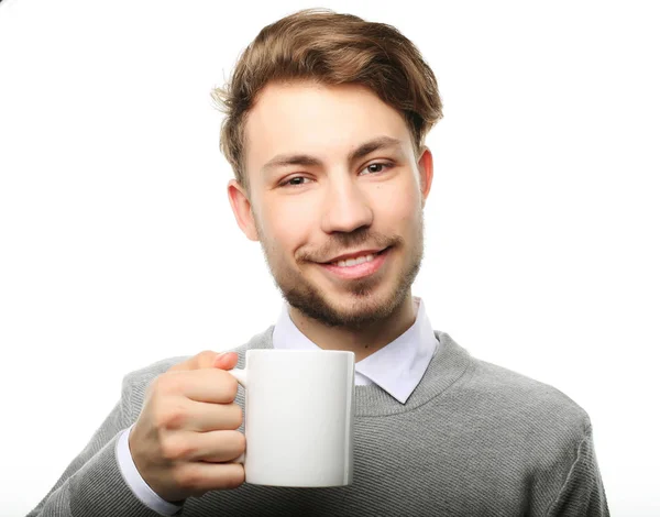 Portrait of handsome young man with cup, isolated on white. — Stock Photo, Image