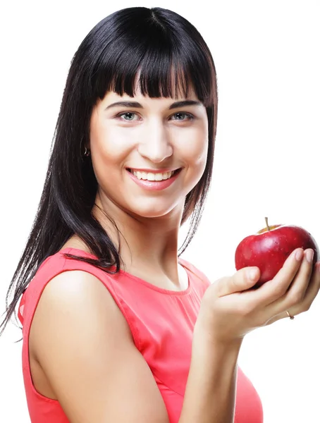 Hermosa mujer morena con manzana roja en las manos —  Fotos de Stock