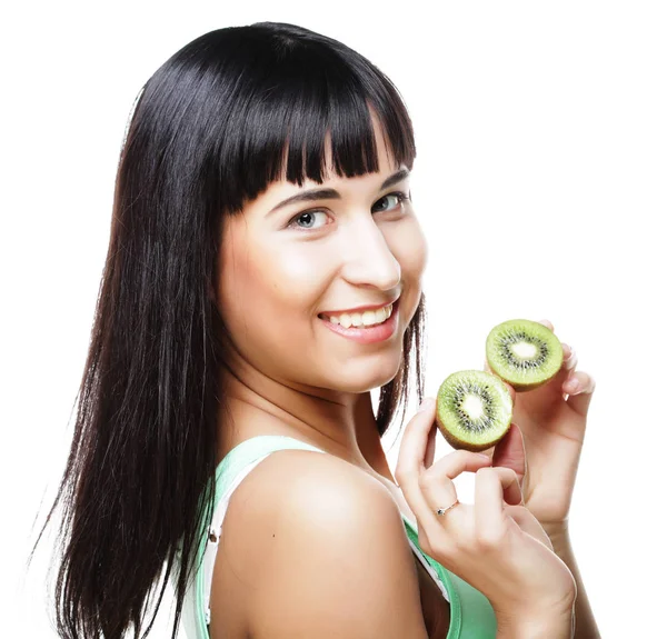 Happy woman holding kiwi — Stock Photo, Image