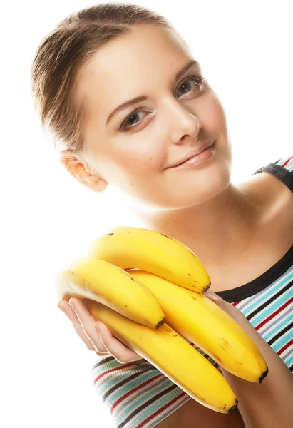 Smiling young woman with banana — Stock Photo, Image