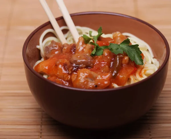 Chinese food - noodles with meat