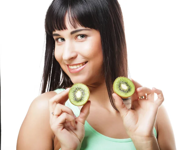 Happy woman holding kiwi — Stock Photo, Image