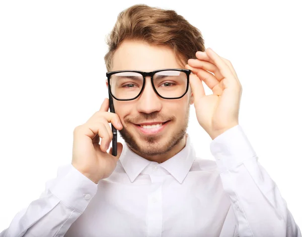 Portrait of a young businessman talking on the phone — Stock Photo, Image