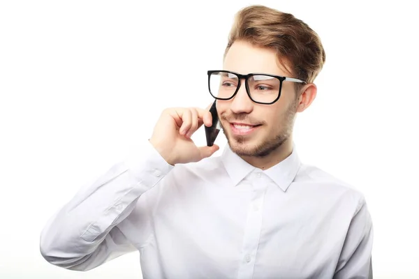 Portrait of a young businessman talking on the phone — Stock Photo, Image